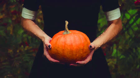 Cinderella holding a pumpkin